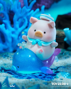 LuLu the Piggy - Ocean Blind Box Series: Toy pig in sailor outfit on whale, water background. Celebrate carnival parade with LuLu! 8 blind boxes, 8 styles, special editions possible. Size: 6-7CM.