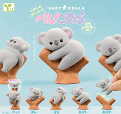 Baby Koala Gacha Series toy held in a hand, part of Strangecat Toys' preorder collection, offering a surprise plush in a blind box format.