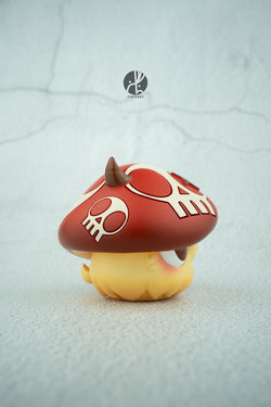 A limited edition Mushroom Bobbi toy by Zintears, made of resin, 7 cm tall. Close-up showing mushroom hat, skull, and horns. Preorder - Ships Aug 2024.