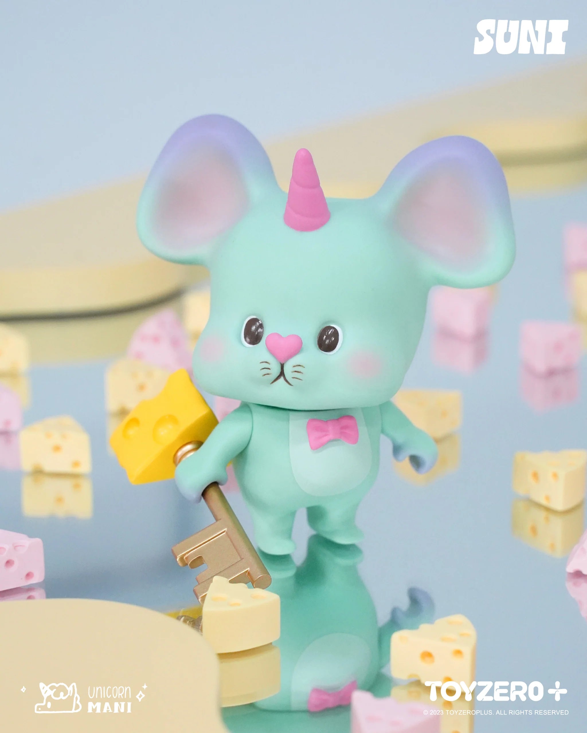 Toy mouse holding a key on an adventure, inspired by Suni the food critic.