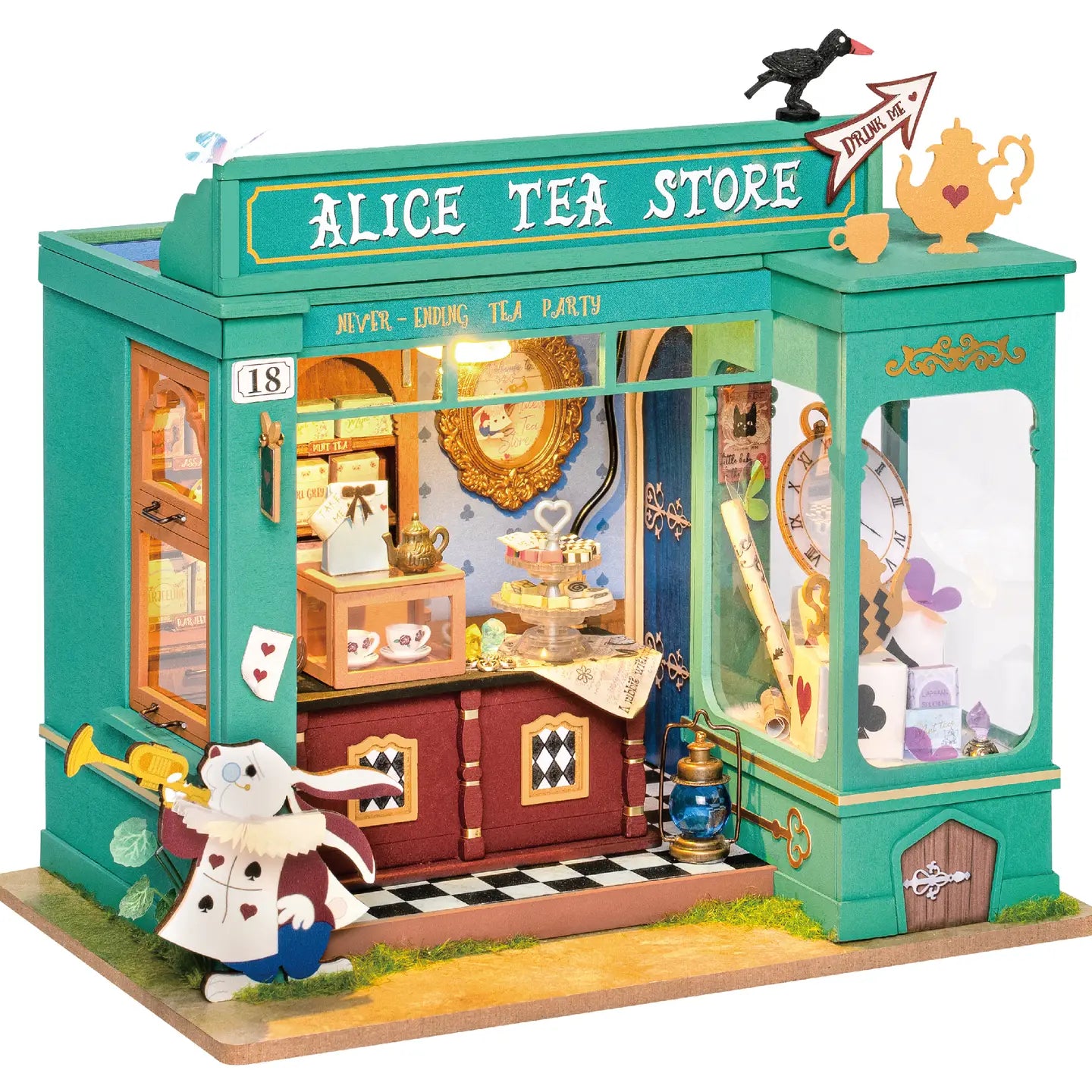 A whimsical DIY miniature dollhouse resembling Alice's Tea Store, featuring a cat house with three floors, cat face design, and various cat-friendly functions for eating, drinking, and playing. Dimensions: 11.4 x 7.7 x 2.8 in.