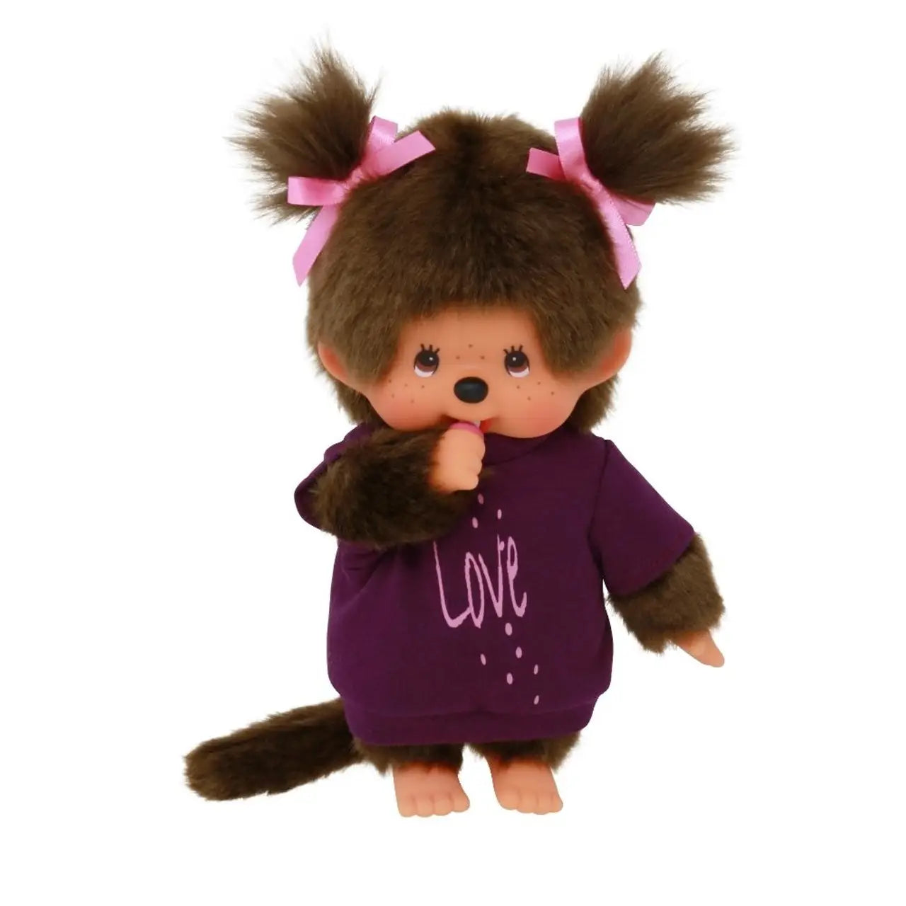 Monchhichi doll with red bib, dressed in Tee Love Dress Girl outfit. Soft body, plastic head, hands, and feet. Perfect for cuddling and adventures. Ideal gift for collectors.