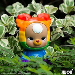 Alt text: Preorder Jrbo Rainbow Edition toy bear by JWON, 10cm resin figure, nestled in leaves.