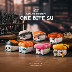 One Bite SU Blind Box Series featuring adorable sushi toys with faces, showcasing various playful designs on a table.