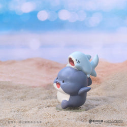 A blind box series featuring Shahimi Shark 2 figurines atop small animals on sand. Preorder now to collect all 5 designs.