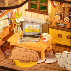 Rolife DIY Miniature House - Puppy's Cozy Villa DG169, featuring a toy dollhouse with a miniature laptop, coffee mug, and canine-themed decor, perfect for dog lovers.