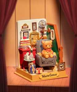 A toy bear in a holiday-themed living room setting, part of the Holiday Living Room Mini DIY House kit from Strangecat Toys. Easy assembly, no painting required. Dimensions: 5.3 x 2.2 x 5.9 in.