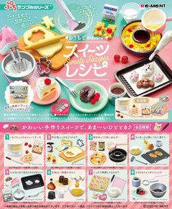 Petit Sample-Sweets Recipes Re-ment Blind Box Series featuring toy cookbook, dessert miniatures like cake and doughnut, and baking accessories.