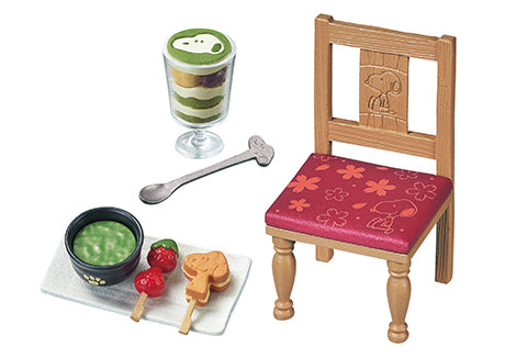 Japanese cafe SNOOPY Re-ment Blind Box Series featuring a toy chair and table set with miniature food items, part of an 8-design collection.