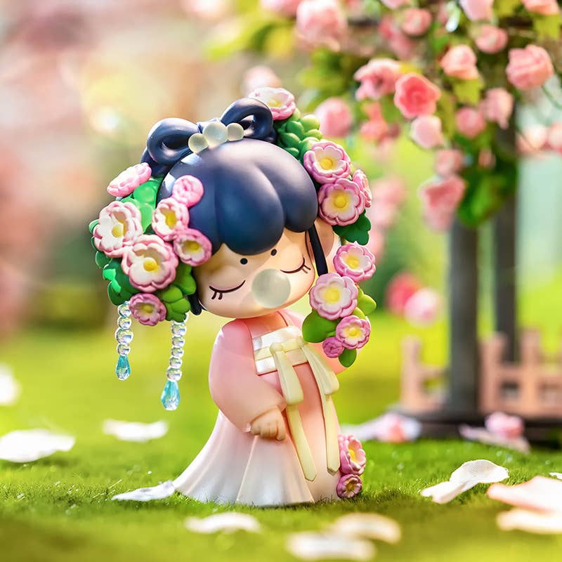 ZPXX Nanci series Poetic Beauty Doll Surprise Box featuring a toy figurine adorned with flowers, part of a collection with 12 figures and one secret edition.