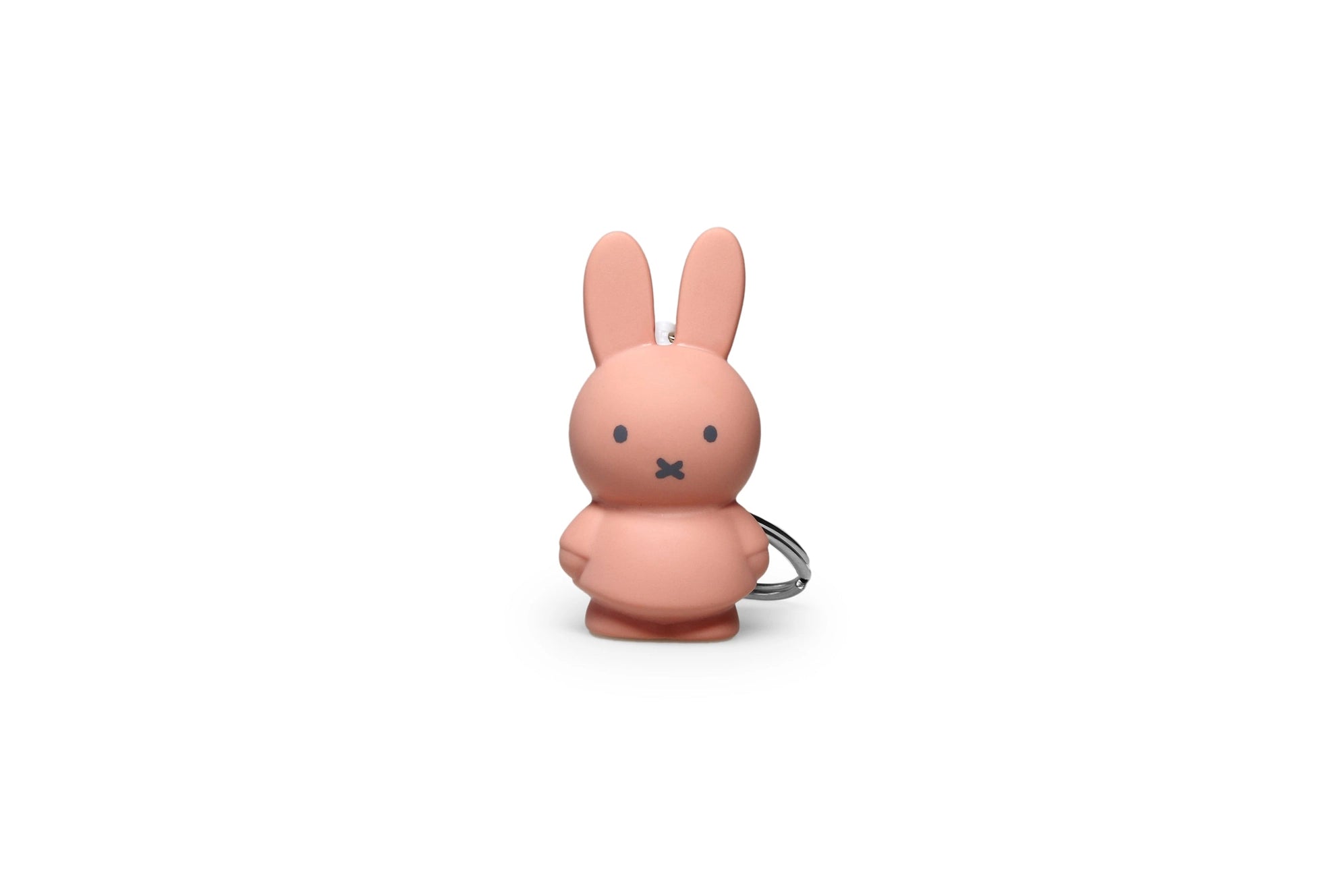 A Miffy Keychain, a toy resembling a pink bunny with black eyes, from Strangecat Toys. CE Certified plastic, 1.3x1x2.4 in, 0.02 lb.