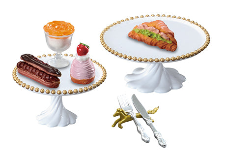 My Secret Tea Time Re-ment Blind Box Series showcasing a table of assorted desserts and pastries, featuring six unique designs.