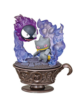 Statue of a cat seated in a teacup from the Pokémon Little Night Collection - Re-ment Blind Box Series.