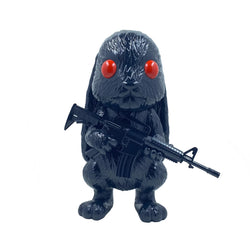 Toy rabbit holding a gun, part of ANIMAL (Shadow Variant) by Jermaine Rogers vinyl figure collection.