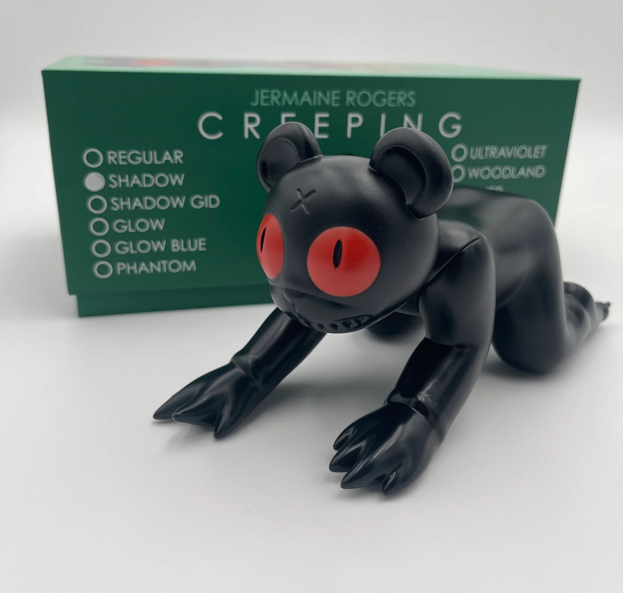 Vinyl toy of Creeping Dero (Shadow Variant) by Jermaine Rogers, limited edition of 250pcs, 8 with red eyes and unique design.