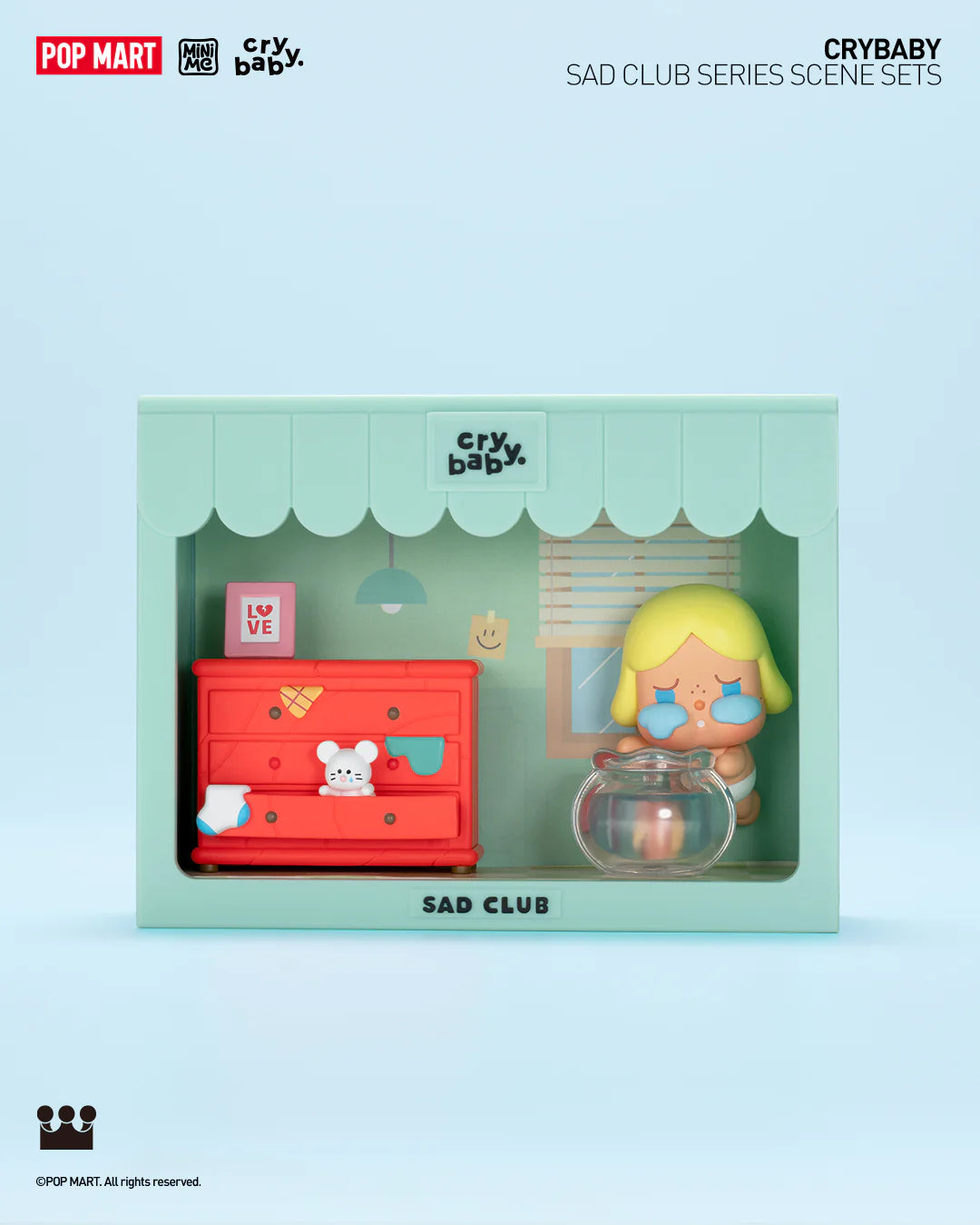 A toy box with a doll and a fish bowl from CRYBABY Sad Club Scene Sets Blind Box Series.