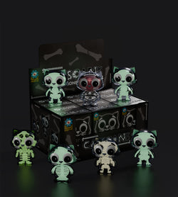 Catscans (Bare Bones) Blind Box featuring small cartoon cat figures with varying skeleton designs, part of a collectible toy set.