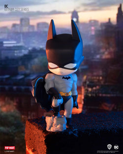 A toy figurine of a superhero from POP MART DC Gotham City Blind Box Series.