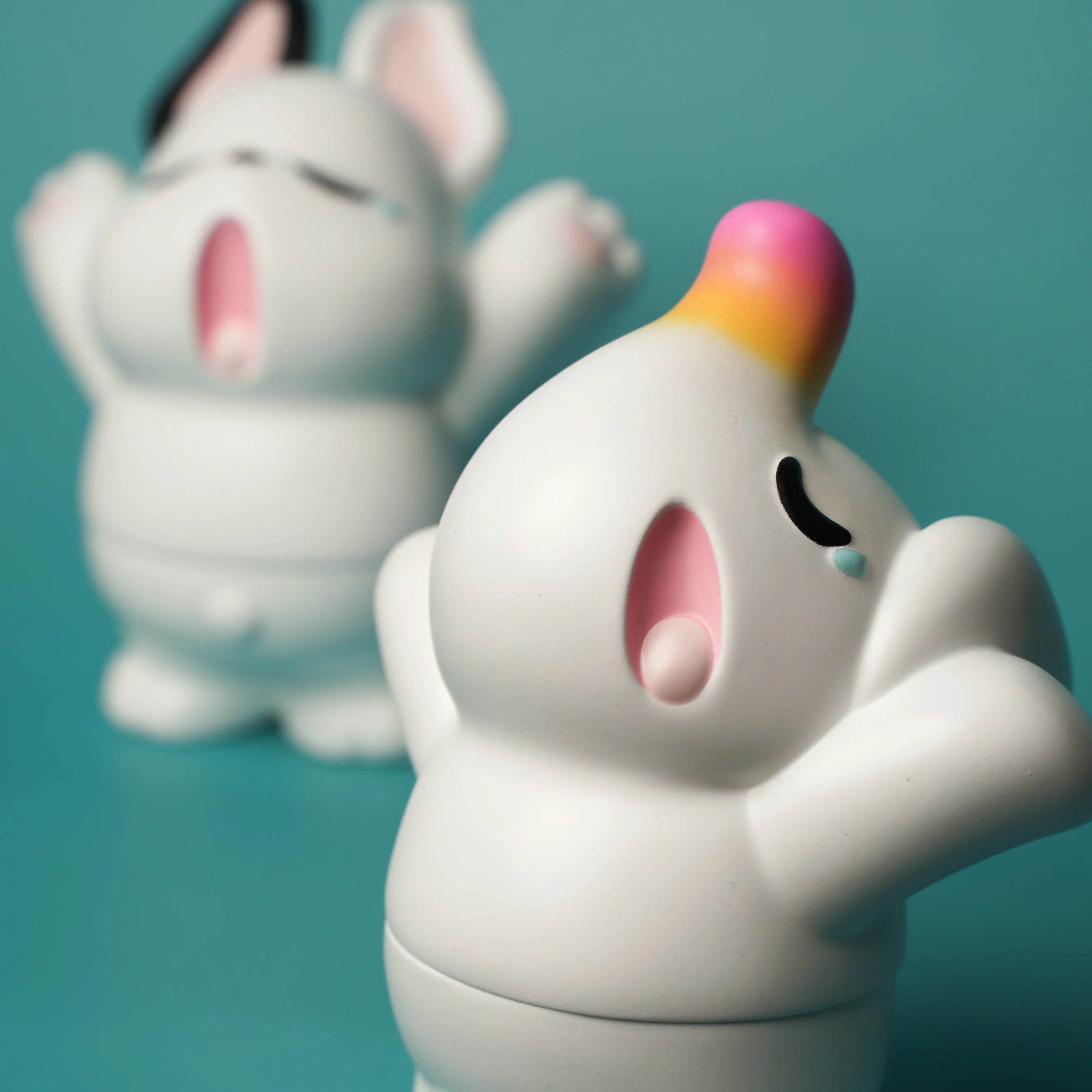 A Sofubi toy set featuring Elfie and Nimbus yawning, sized about 12cm, packaged with a header card. From Strangecat Toys, known for blind box and art toys.