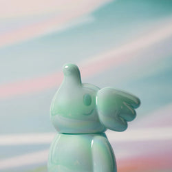 Alt text: Elfie Here I Am! 100% Tiffany Blue Edition by Too Natthapong, a 3-inch soft vinyl figurine with a clean silhouette, close-up view.