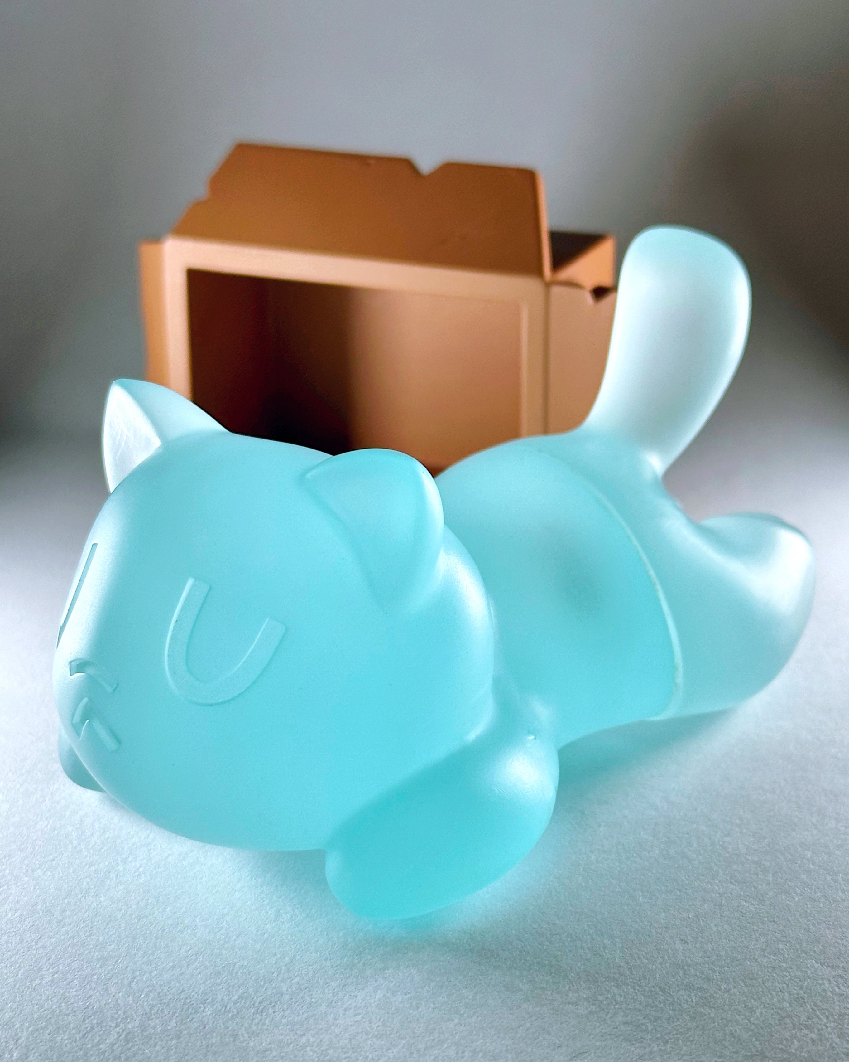 Little Mort by Saint Monday, a blue resin cat toy featuring a magnetized design, measuring 5” long, 4” wide, and 2.5” tall.