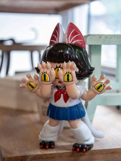 Alt text: Momochan figurine by Abao x Grape Brain, 20cm sofubi toy, depicting a character with hands on its face.