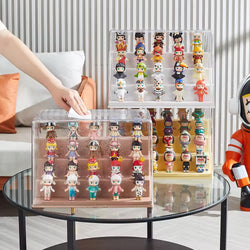 A person placing small action figures in a stackable Mini Figure Display Case from Strangecat Toys. Preorder - Ships July 2024. Available in Medium and Large sizes.