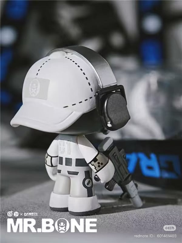 MR.BONE- white solomen toy figure with helmet and headphones, includes mask, made of PVC, approximately 8 CM tall.