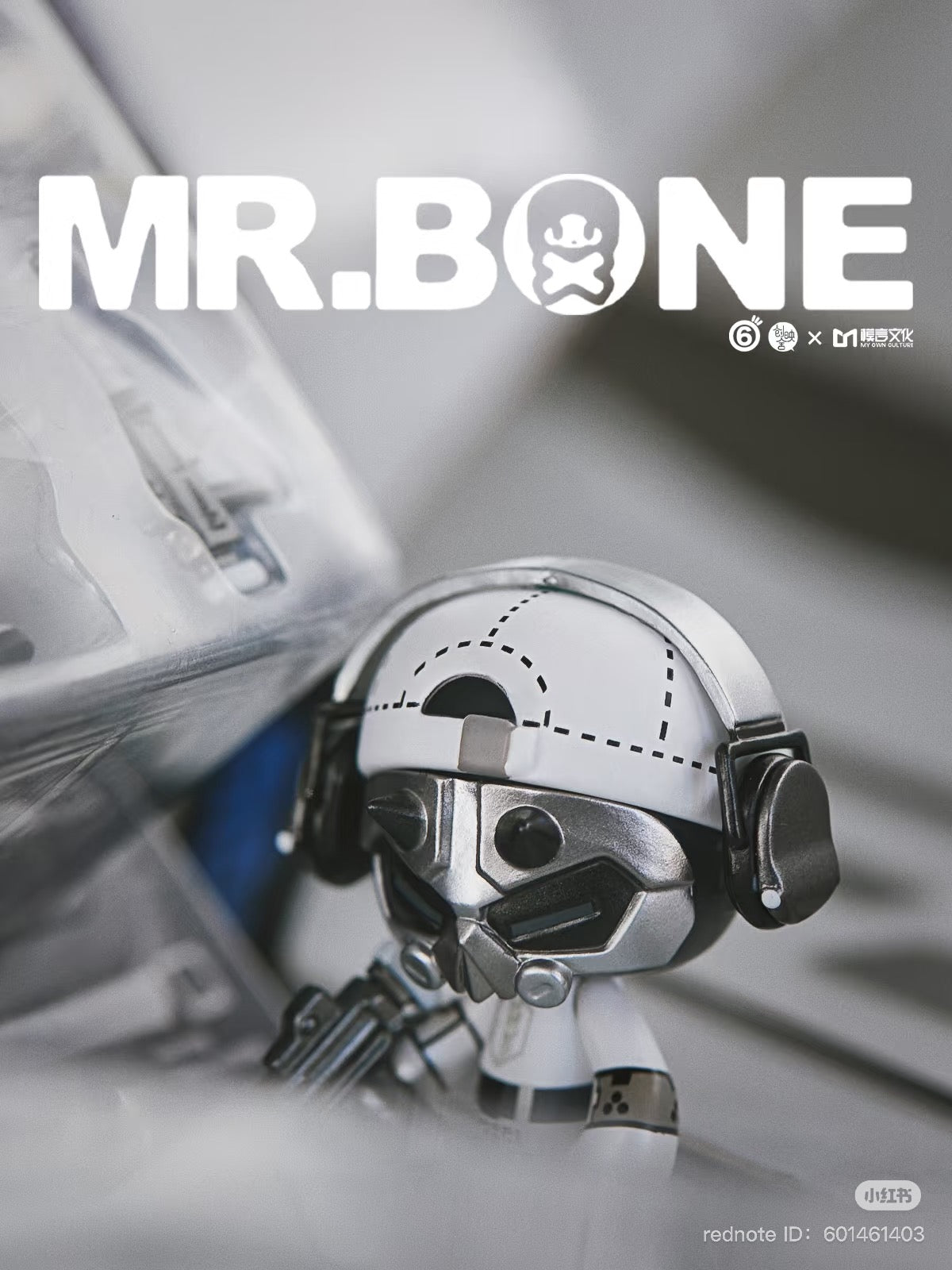 MR.BONE- white solomen toy figurine with black headphones, featuring a mask and gun accessory, crafted from PVC, approximately 8 CM in size.