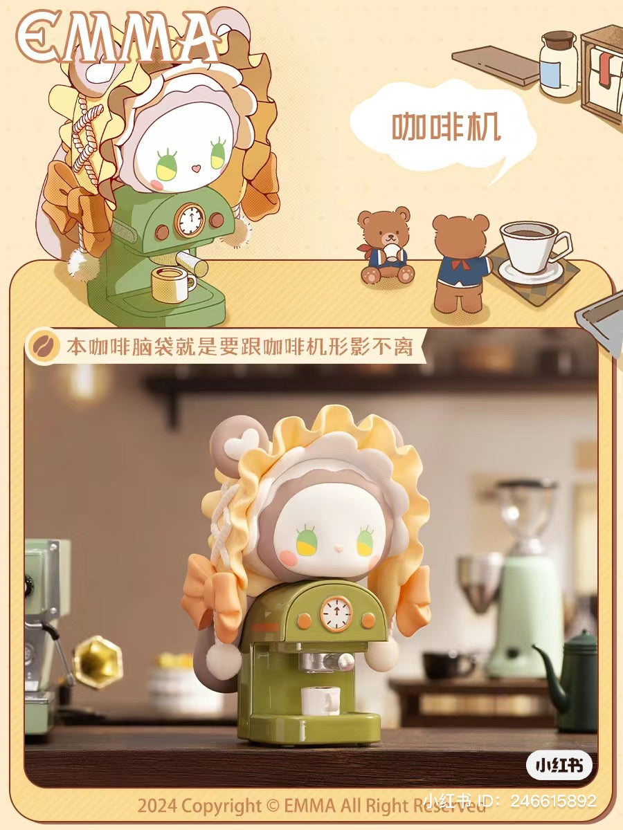 A blind box series featuring EMMA Secret Forest Coffee Shop designs, including a toy on a machine, a green coffee maker, and cartoon characters. Preorder now for July 2024.