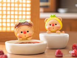 OYO Fruit Party HIPPER Blind Box Series featuring two whimsical toy animals in bowls, part of a collectible series with adhesive for versatile attachment.