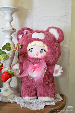 Nommi - 400% Goodnight Bear Plush Series Blind Box features a stuffed bear doll with a pink bow, part of a limited design collection.