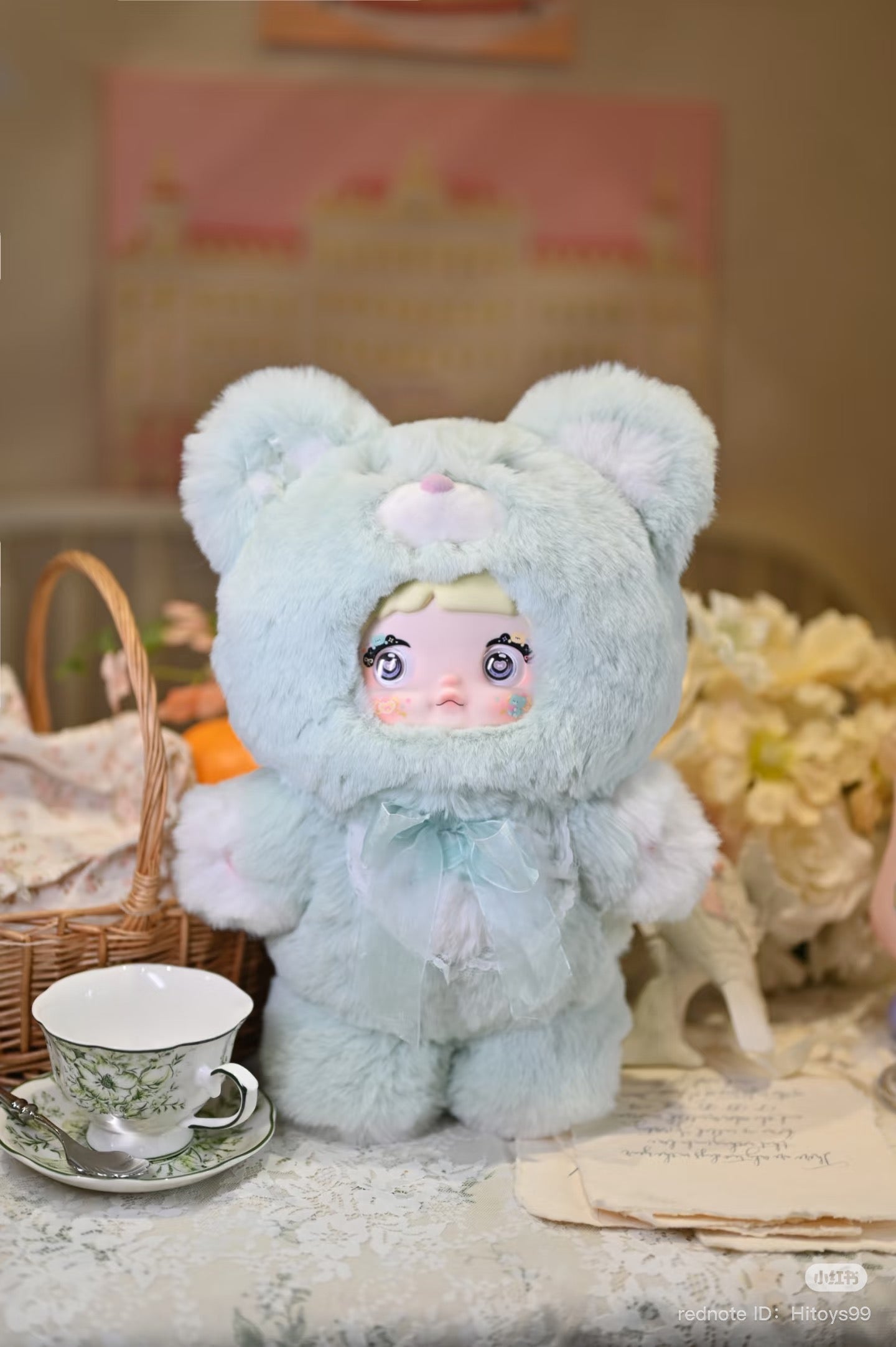 Nommi - 400% Goodnight Bear Plush Series Blind Box featuring a doll in a bear garment, part of a collectible art toy series.