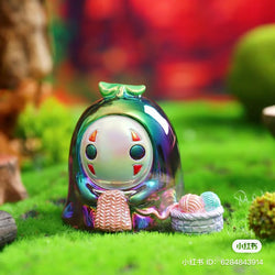 Alt text: No Face Man Blind Box toy on grass, featuring a white face. Series includes 6 regular designs and 5 secret variants.