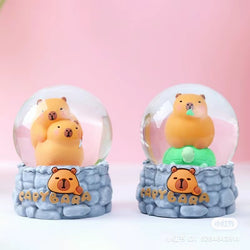 Capybara Snow Globe Blind Box Series features small bears inside snow globes. Purchase includes 6 regular or a mix with 1 secret design.