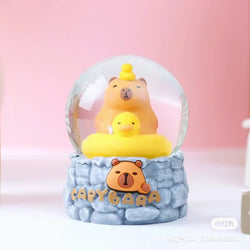 Snow globe featuring toy bears and ducks, part of the Capybara Snow Globe Blind Box Series, with 6 regular and 5 secret designs.