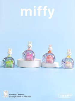 MiffyElephant Blind Box Series featuring glass rabbit figurines on a white platform, part of a collectible toy set with regular and secret designs.