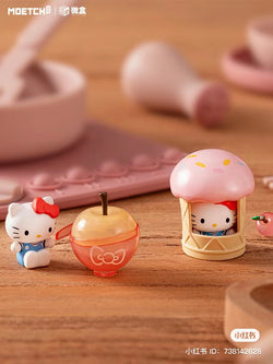 Hello Kitty Big Apple Workshop Series Mini Box Micro Blind Box Series figurines displayed on a table.