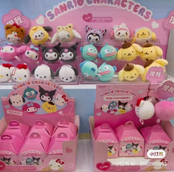 Display of Sanrio characters Soft Tuanzi Series Plush Relaxing Toy Blind Box, featuring various stuffed animal designs.