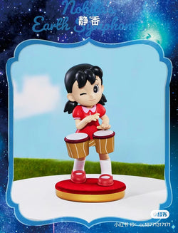 Alt text: Doraemon the Movie: Nobita's Earth Symphony Blind Box Series toy figurine of a girl playing drums, available for preorder, ships late July 2024.