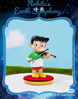 Cartoon figurine of a boy playing a violin from Doraemon the Movie: Nobita's Earth Symphony Blind Box Series, available for preorder.