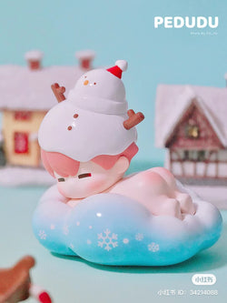 Alt text: PEDUDU Lies on Cloud Blind Box Series toy featuring a baby figurine with a snowman hat.