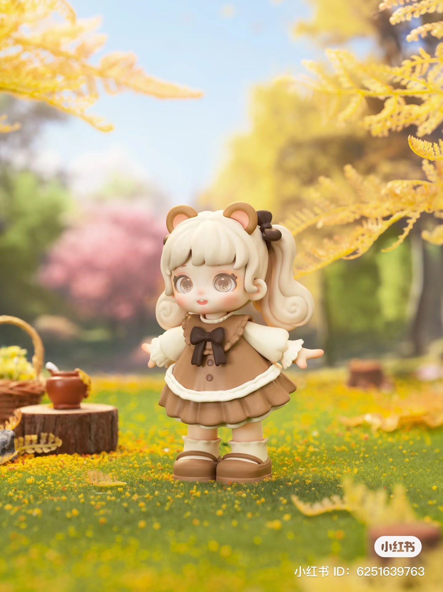 Alt text: Miana - Tea Party In The Forest Blind Box Series toy doll displayed in a forest setting.