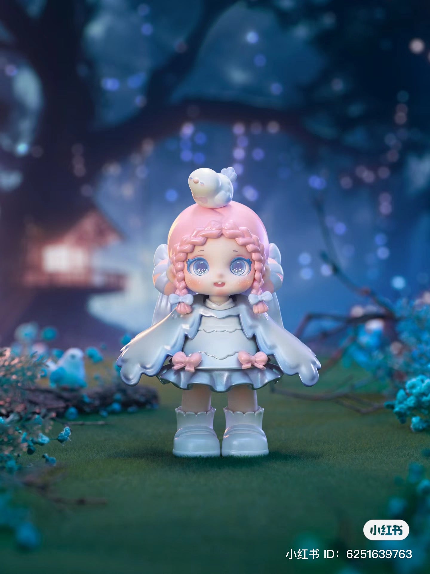 Alt text: A toy doll named Miana with pink hair and a bird on her head from the Tea Party In The Forest Blind Box Series.