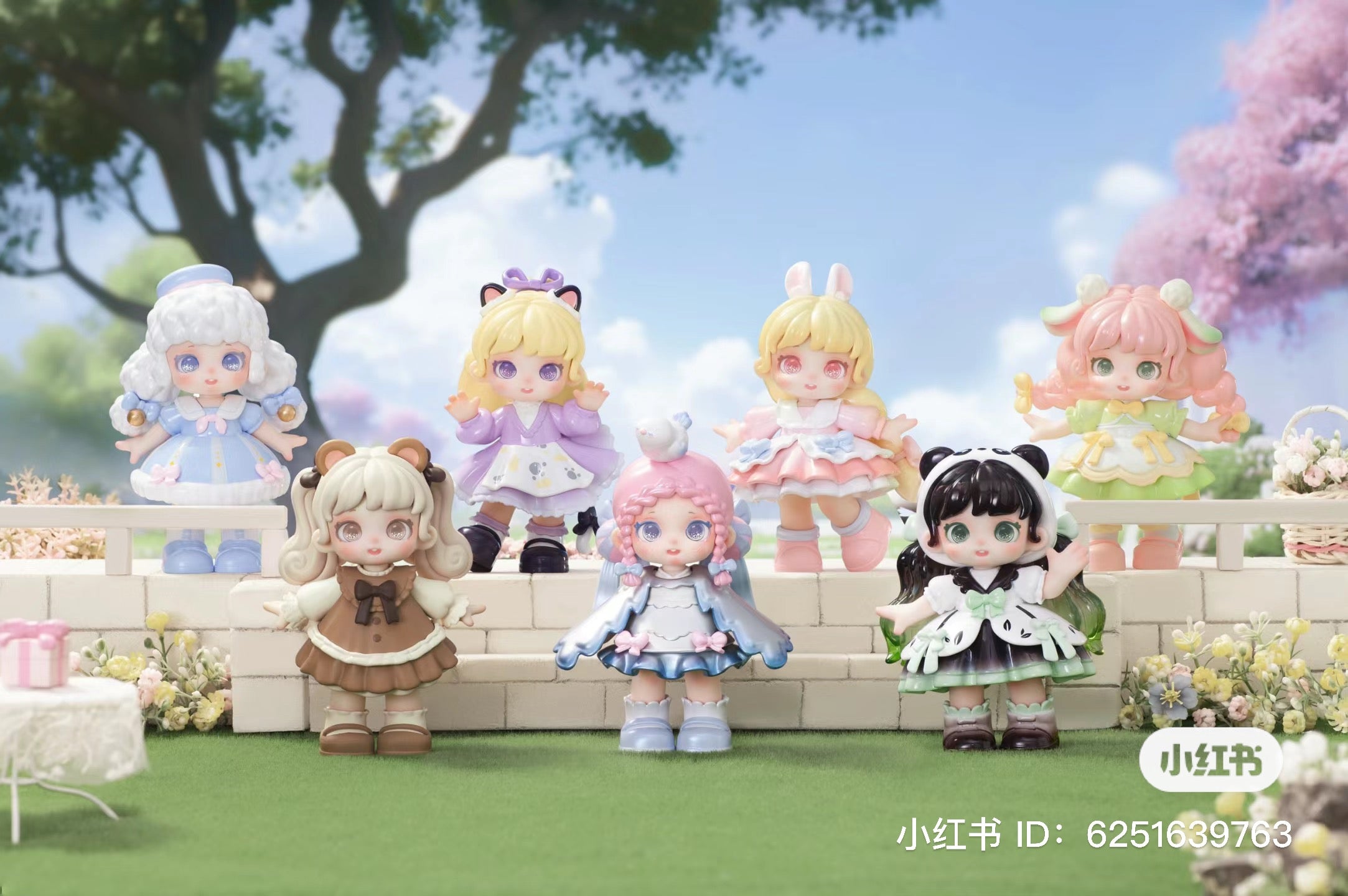 A collection of small Miana - Tea Party In The Forest Blind Box Series dolls, featuring various hair colors and outfits, displayed together.