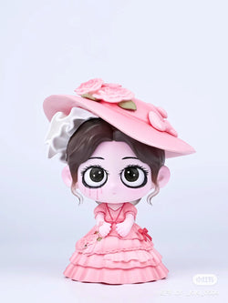 Statue of a girl in a pink dress and hat, titled Kiki Afternoon Tea, made of resin/PVC, 11cm tall.