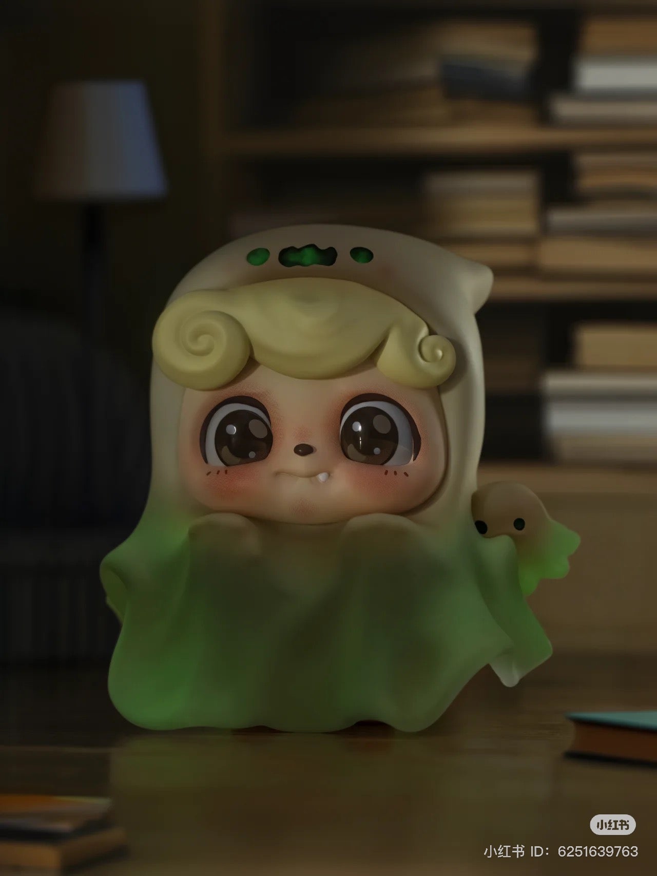 Be Your Q Baby Blind Box Series toy figurine featuring a cartoon child with large eyes and a green cloth. Preorder available, ships Aug 2024.