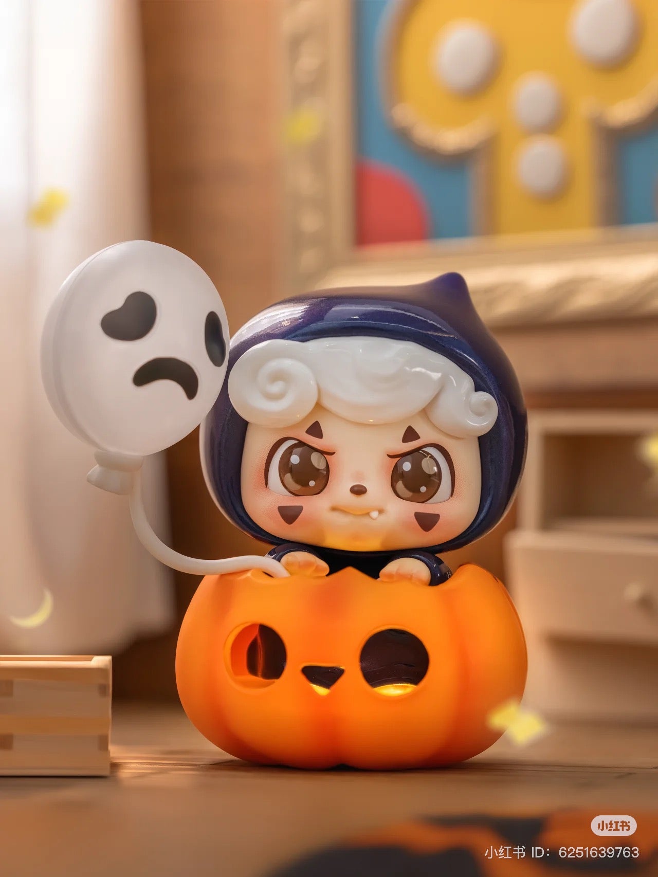 Toy figurine inside a pumpkin from the Be Your Q Baby Blind Box Series. Preorder for August 2024.