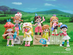 Milay Girl's Syndrome Blind Box Series: Cartoon doll figurines displayed on grass, featuring various designs, including one holding a suitcase. Preorder for Sept 2024.