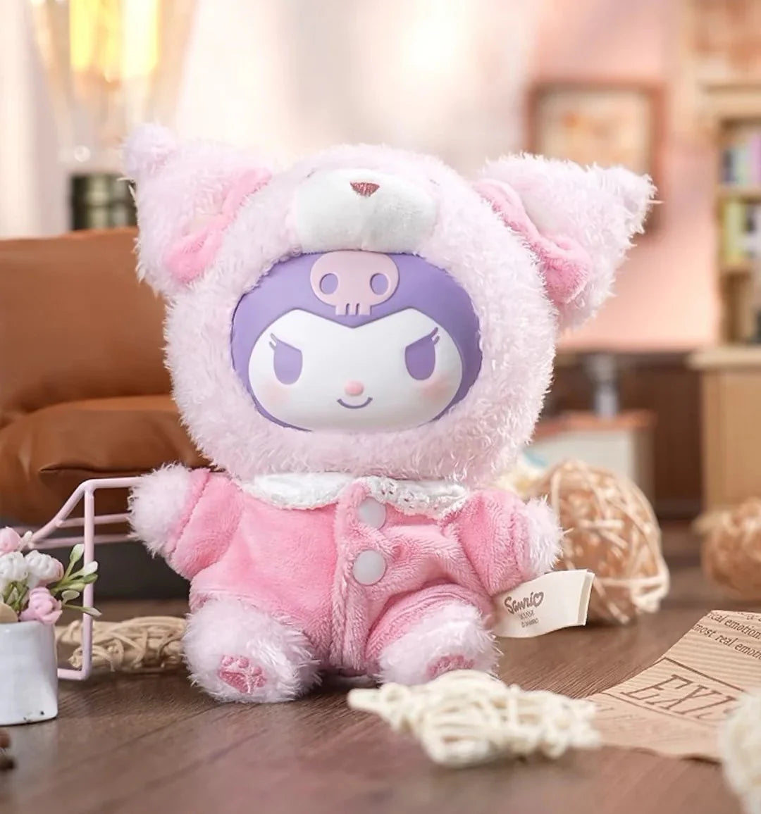 Kuromi Peach Baby Plush Keychain Blind Box featuring a pink stuffed animal toy on a table, ideal for collectors of unique plush accessories.